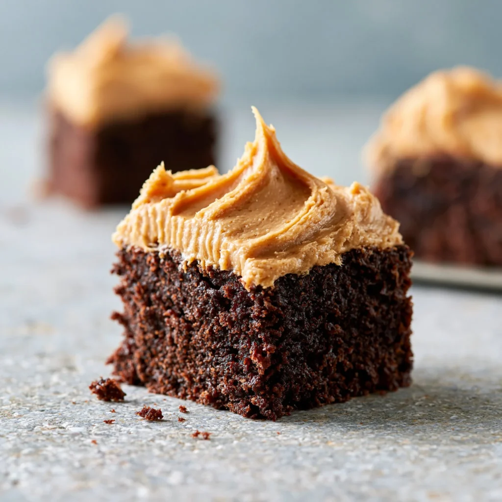 Delicious Chocolate Peanut Butter Sheet Cake with frosting and toppings